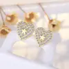 2026 Novo Produto Brincos de Estrela Estilo Coreano de Luxo Leve em Ouro 14K Agulha de Prata Esterlina S925 Coração Totalmente Diamantado Brincos Retrô Europeus e Americanos