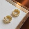 Pendientes Chanel con hebilla de perla de alta gama para mujer, ligeros, de lujo, elegantes, elegantes, con forma de nicho, elegantes, aros, elegantes, a la moda, joyería para todas las ocasiones.