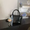 Bolso de mano pequeño para mujer de moda transfronterizo 2026 otoño nuevo bolso bandolera texturizado bolso de hombro casual versátil para el día a día