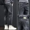 Jeans Masculino de Primavera Masculino Atacado Novo Reto Solto Elástico Marca da Moda Emagrecedor Americano Retrô Calças Compridas Verão