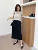 Saia de Cor Sólida com Cadarço e Recortes para Mulheres Outono Nova Slim de Comprimento Médio Roupa Externa Cintura Elástica Versátil Saia Evasê