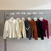 Cárdigan de punto con solapa irregular de diseño 2026 Otoño/Invierno Nuevo Estilo Elegante Pequeño Estilo Chanel Cintura ceñida abrigo suéter para mujer