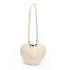 Bolso de diseño de nicho de moda para mujer, nuevo estilo 2024, popular bolso bandolera combinable, mini bolso en forma de corazón, bolso de color liso para debajo del brazo.