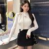 Camiseta de manga larga ajustada con tirantes finos, elegante y femenina, de Dongdaemun, Corea del Sur.