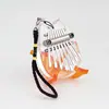 Mini piano de pulgar más vendido transfronterizo, kalimba de cristal acrílico de 8 tonos, instrumento musical tocado con los dedos, adorno colgante popular