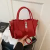 Moda Retro de Comercio Exterior Bolso Cubo Portátil Nuevo Versátil Popular Pequeño Cuadrado para Viajar Diariamente Bolso de Hombro Cruzado Casual para Mujeres