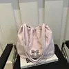 Bolsa de Ombro Estilosa Versátil Simples com Laço Nova Moda Primavera 2026 Estilo Coreano Alta Aparência Cordão Grande Capacidade