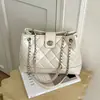 Bolso de cadena con rombos para mujer 2026 nuevo otoño alta gama retro lujo ligero para el día a día bolso de hombro único bolso cruzado tipo cubo