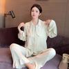 Pijama de dos piezas estilo coreano para mujer, nuevo, de primavera y verano, bonito, de seda helada, holgado, fino y puro.