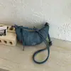 Bolsa feminina de nicho da moda, nova bolsa de ombro popular de moda verão 2026, bolsa de bolinho, bolsa transversal tipo chifre