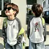Nova Camiseta Térmica de Manga Longa para Meninos Outono/Inverno 2026 para Crianças de Média e Maior Porte Manga Raglan Roupa Infantil Camada Base Top Casual