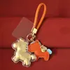 Chaveiro Dourado do Ano do Cavalo Pingente Pequeno Decoração de Bolsa Artesanato em Ouro Puro Decoração Presente de Aniversário Souvenir Cultural e Criativo
