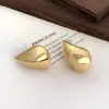 Brincos Europeus e Americanos Minimalistas Lisos da Moda em Forma de Gota Transfronteiriços Brincos de Tarraxa Nicho com Toque de Luxo para Mulheres Atacado