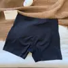 Pantalones cortos de seguridad y ropa interior dos en uno estilo verano fino para mujer anti-exposición seda de hielo sin costuras nuevo 2026 pantalones de capa base para niñas
