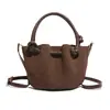 Bolso de un solo hombro, bolso cruzado, bolso de gamuza de moda, bolso tipo cubo con acabado mate, bolso versátil de alta gama para mujer, personalizado de fábrica