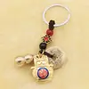Llavero de monedas de cinco emperadores de cobre real accesorios de aleación gato manzana candado carácter de bendición de calabaza abierta colgante de joyería colgante