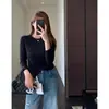 El atuendo perfecto para otoño e invierno: una camiseta de manga larga lisa, cómoda, cálida y adelgazante, con cuello redondo, perfecta para usar en capas