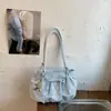 Bolsa de mano de lunares de gran capacidad transfronteriza para mujer, nuevo estilo verano 2026, bolso de hombro o axila plisado con lazo de nicho