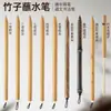 Venta al por mayor del fabricante Plumas de bambú hechas a mano para caligrafía de Xizang, Plumas de inmersión de tinta de bambú con puntas planas oblicuas izquierda y derecha para caligrafía de Xizang