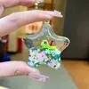 Adorno pequeño de pez marino acrílico, llavero de pez de océano, colgante creativo de botella de arena líquida de pez payaso, decoración de bolsa al por mayor