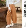 Pantalones tipo linterna azul marino para mujer, nuevo estilo 2026, pantalones de pierna ancha con caída fluida, adecuados para primavera y otoño, diseñados para hacer que las figuras menudas parezcan más delgadas, y son cropped hasta el tobillo