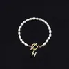 Pulsera de Moda de Venta Caliente Transfronteriza 2026 con Diamantes y 26 Letras, Pulsera de Perlas de Imitación Ovaladas, Disponible para Venta al por Mayor para Mujeres