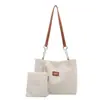Bolsa Feminina Versátil e Estilosa 2026 Nova Versão Coreana Bolsa Tote Grande Capacidade Retrô Bolsa Tote Cor Sólida Bolsa de Ombro Feminina