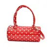 Bolso de lunares de nicho para mujer 2026 nuevo estilo moderno versátil bandolera para el hombro bolso de mano pequeño exquisito bolso tote cilíndrico