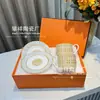 Suministro Directo de Fábrica H Marca Taza y Platillo de Café Juego de Porcelana Hueso Juego de Té de la Tarde Taza de Té Negro Taza y Platillo Doble de Lujo Ligero Regalo de Boda