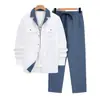 Conjunto de Camisa de Cuello Cubano para Hombre Europeo y Americano al por Mayor en Stock, Camisa de Manga Larga con Solapa de Bloques de Color, Conjunto de Dos Piezas de Pantalones Largos Casual