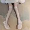 Calcetines altos negros con lazo para la rodilla, calcetines largos finos estilo JK japonés, calcetines sexys de encaje, calcetines de red de pesca de verano
