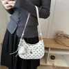 Bolso de mano de moda estilo coreano con lazo de lunares para mujer, nuevo diseño de nicho transfronterizo, versátil bolso cruzado para el hombro y debajo del brazo para el día a día