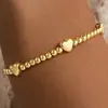 Pulsera Cruzada Chapada en Cobre 14K para Exportación Europea y Americana, Nuevo Estilo de Moda, Pulsera Personalizada Sencilla Casual con Cuentas Doradas y Cordón Elástico