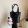 Bolso Cubo de Diseño de Nicho Transfronterizo para Mujer 2026 Nuevo de Moda Bolso de Mano Simple Bolso Cruzado de Hombro Versátil Casual