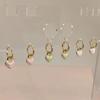 Pendientes de lujo ligeros y dulces con diseño de nicho y hebilla de oreja de alta gama, nuevos y elegantes pendientes de verano de moda 2024 para mujer.