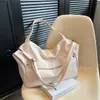 Bolso de Mujer de Comercio Exterior 2023 Nuevo Bolso de Gran Capacidad para Todo Tipo de Ropa Bolso Cruzado de Moda para Mujer Bolso de Hombro de Nicho Bolso Tote