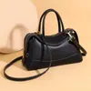 Bolso tipo almohada de alta gama estilo coreano para mujer 2026 Nuevo bolso tote pequeño de alto valor para el trabajo, casual, de nicho, cruzado, de mano