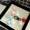Fábrica de Origen Creativo Lindo Dibujo Animado Estilo Japonés Conejo Miffy Dibujo Animado Campana Colgante Bolsa para Llaves Colgante para Teléfono Móvil