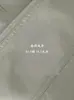 Gabardina de Cuello Alto Jiangzuo de Alta Gama con Silueta Elegante de un Botón para Mujer, Otoño 2026, Estilo Coreano de Longitud Media Versátil 1960