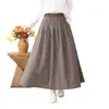 Colección Otoño 2026: Falda midi de cuadros de algodón y lino con cintura elástica, estilo artístico japonés, falda de línea A adelgazante para mujer