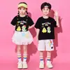 Roupa de performance de cheerleading para o Dia das Crianças, conjunto de manga curta com estampa de desenho animado para jardim de infância, fantasia de performance esportiva para aluno do ensino fundamental