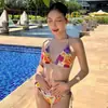 Bikini de dos piezas transfronterizo europeo y americano Nuevo Sexy sin espalda con tiras Moda Estampado Vacaciones Spa para Mujer