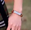 Pulsera de cuero con letra de marca de aleación Pulsera punk europea y americana pulsera de cuerda de cáñamo tejida a mano al por mayor