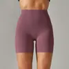 Pantalones de yoga de estilo nuevo sin línea de vergüenza color piel para mujer, cintura alta, realce de glúteos, compresión abdominal, shorts deportivos de tres puntos
