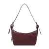 Bolsas de Designer de Nicho para Mulheres Inverno 2026 Nova Bolsa de Ombro Versátil Bolsa Baguete Casual Estilosa Bolsa de Braço Tendência