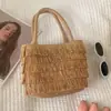 Bolso tejido de paja con un diseño elegante, conveniente para viajar en verano, bolso de mano al hombro, sombrero de protección solar, bolso tejido de paja