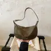 Bolsa transversal retrô de chifre para mulheres, novo estilo outono/inverno 2026, super popular, grande capacidade, adequada para trabalho e deslocamento, bolsa de ombro