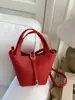 Bolso Cesta con Patrón de Lichi 2024 Nuevo de Moda Simple Casual Bolso de Hombro Cruzado Bolso de Mano Coreano de Nicho Bolso Cubo
