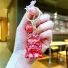 Tendencia Nacional Figura de León Dibujo Animado Llavero Colgante de León Mochila de Estudiante Adorno de Cristal Transparente Llavero al por Mayor