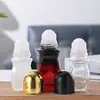 Botella de Vidrio con Rodillo de 50 ml para Aceite Esencial, Botella Dispensadora de Aceite de Masaje, Botella Vacía con Rodillo Esmerilado para Esencias, Botella de Muestra, Botella Transparente